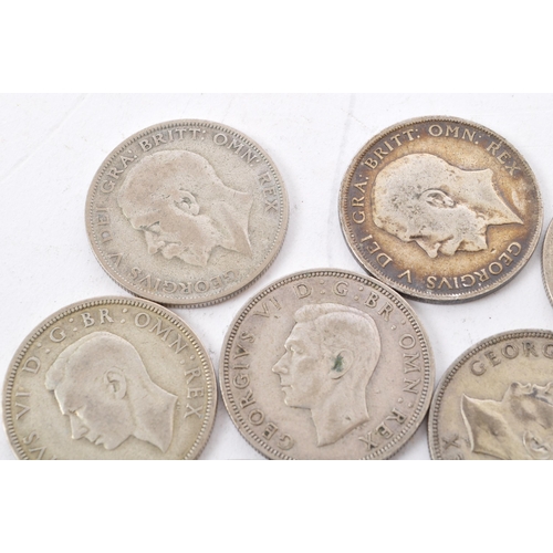 472 - A collection of five George V and three George VI circulated silver half crown coins. The lot to inc... 