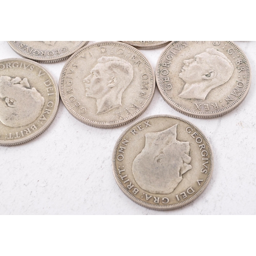 473 - A collection of six George V and two George VI circulated silver half crown coins. The lot to includ... 