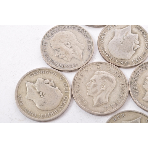 473 - A collection of six George V and two George VI circulated silver half crown coins. The lot to includ... 