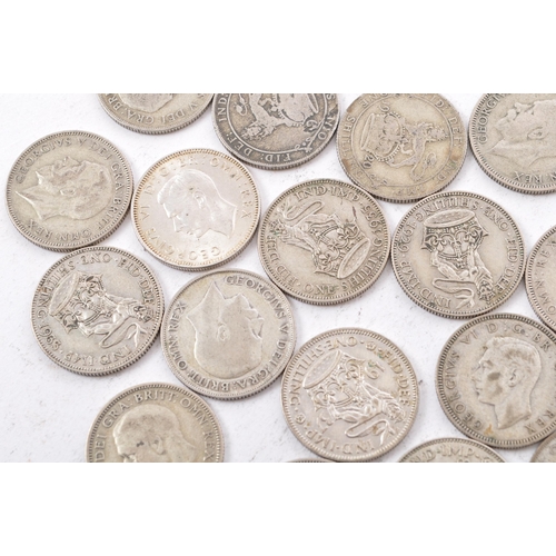 481 - A collection of approximately thirty early 20th century (pre 1947) .500 silver George V and George V... 