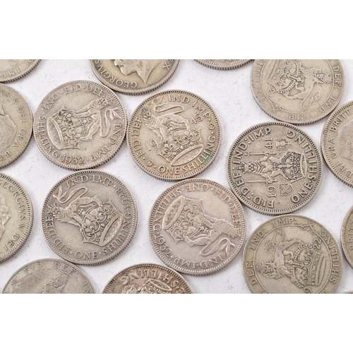 482 - A collection of approximately twenty seven early 20th century (pre 1947) .500 silver George V and Ge... 