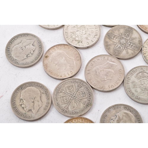 483 - A collection of approximately twenty one early 20th century (pre 1947) .500 silver George V and Geor... 