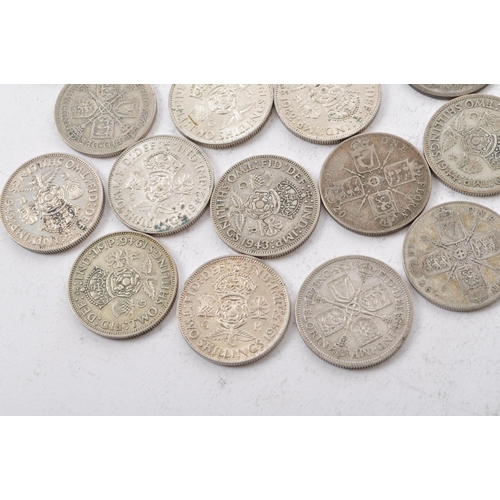 484 - A collection of approximately twenty two early 20th century (pre 1947) .500 silver George V and Geor... 