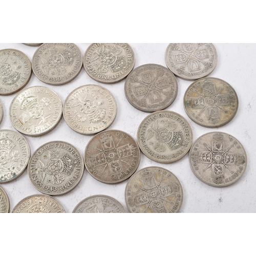 484 - A collection of approximately twenty two early 20th century (pre 1947) .500 silver George V and Geor... 