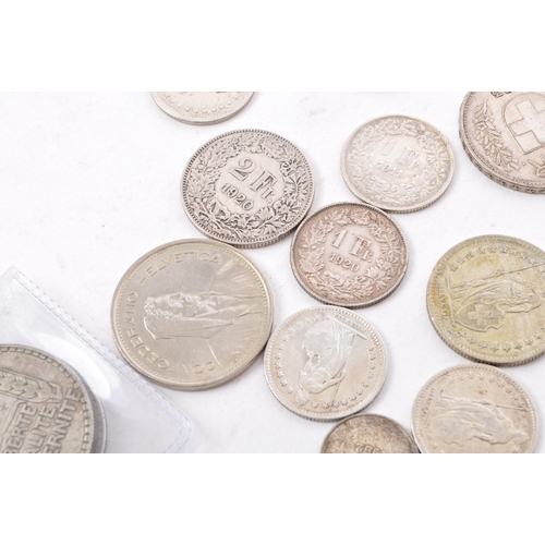 486 - A collection of 19th and 20th century European, French, German, Swiss, and Belgian currency / silver... 