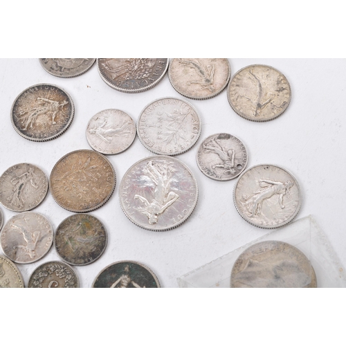 486 - A collection of 19th and 20th century European, French, German, Swiss, and Belgian currency / silver... 