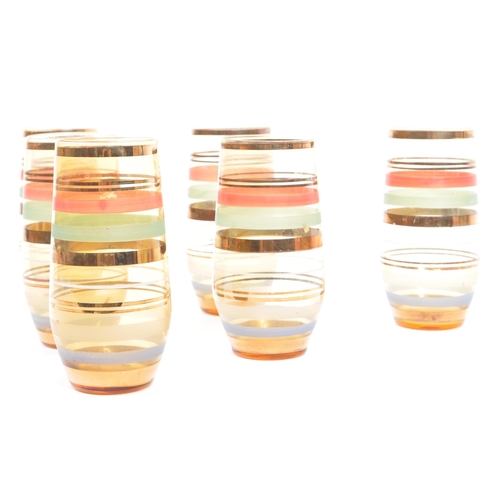 50 - A mid 20th century circa 1970s glass lemonade set. The set consisting of a set of six glasses / tumb... 