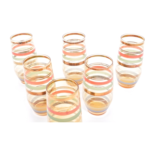 50 - A mid 20th century circa 1970s glass lemonade set. The set consisting of a set of six glasses / tumb... 