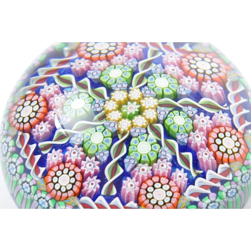 52 - A 20th century circa 1988 Scottish Perthshire glass paperweight. The paperweight having millefiori t... 