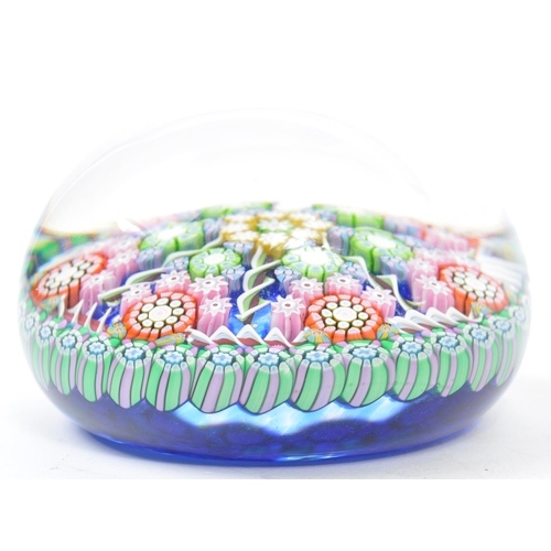 52 - A 20th century circa 1988 Scottish Perthshire glass paperweight. The paperweight having millefiori t... 