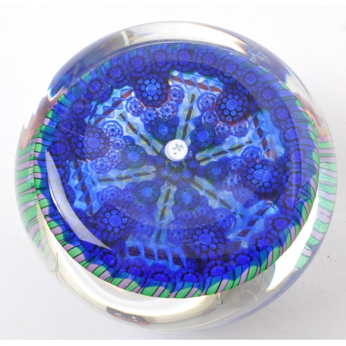 52 - A 20th century circa 1988 Scottish Perthshire glass paperweight. The paperweight having millefiori t... 