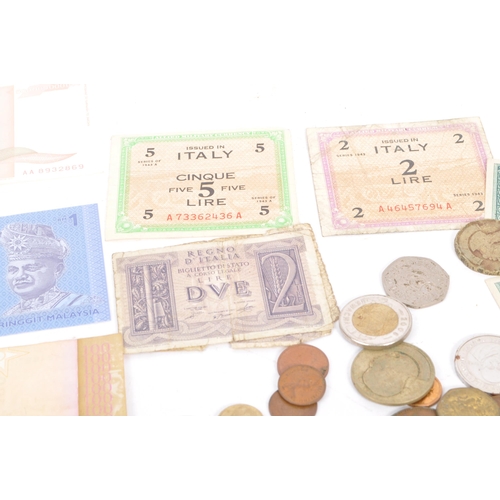 522 - A collection of 20th century foreign currency banknotes and coinage. The collection to include a sel... 