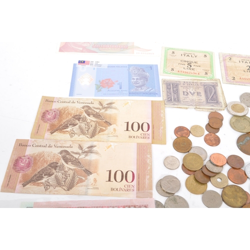 522 - A collection of 20th century foreign currency banknotes and coinage. The collection to include a sel... 