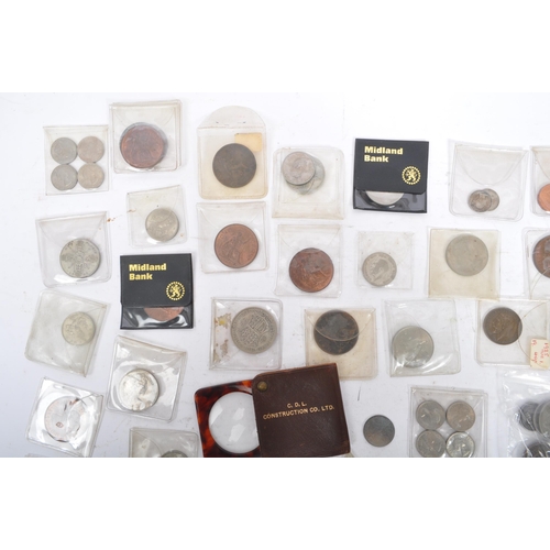 541 - A collection of early to late 20th century United Kingdom and foreign uncirculated currency coins. I... 