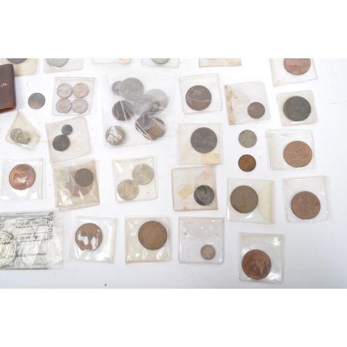 541 - A collection of early to late 20th century United Kingdom and foreign uncirculated currency coins. I... 