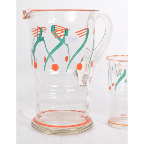 61 - A vintage mid 20th century lemonade set. With hand painted jug and with five drinking tumblers / gla... 