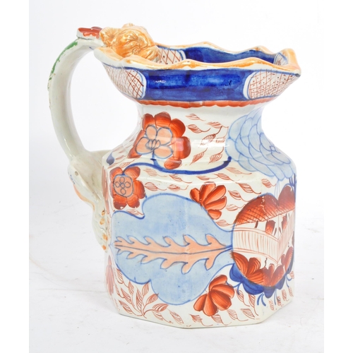 62 - A collection of five early 19th Century and later ceramic ware pottery jugs.With hand painted floral... 