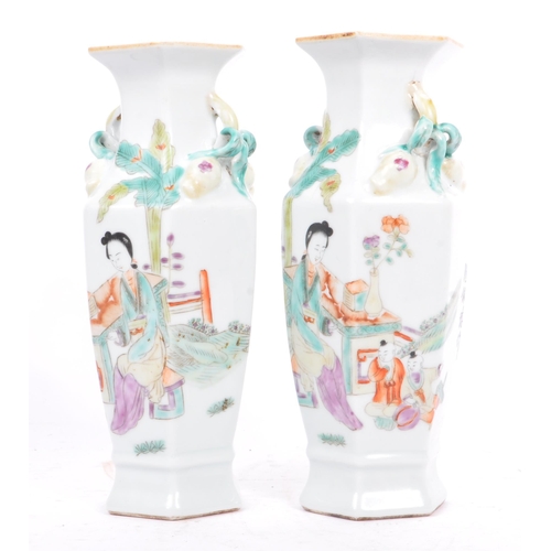 64 - A pair of early 20th century circa 1920s Chinese porcelain vases. The vases having flared octagonal ... 