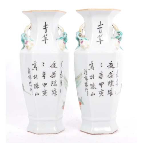 64 - A pair of early 20th century circa 1920s Chinese porcelain vases. The vases having flared octagonal ... 