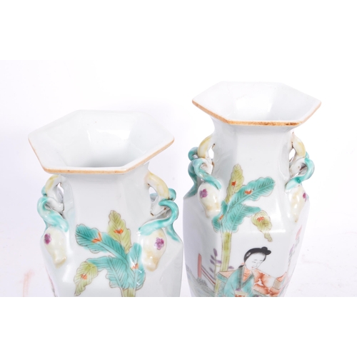 64 - A pair of early 20th century circa 1920s Chinese porcelain vases. The vases having flared octagonal ... 