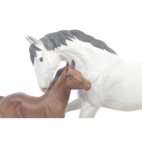 67 - Beswick - Spirit of Affection - A 20th century Beswick porcelain horse group figure modeled in the f... 