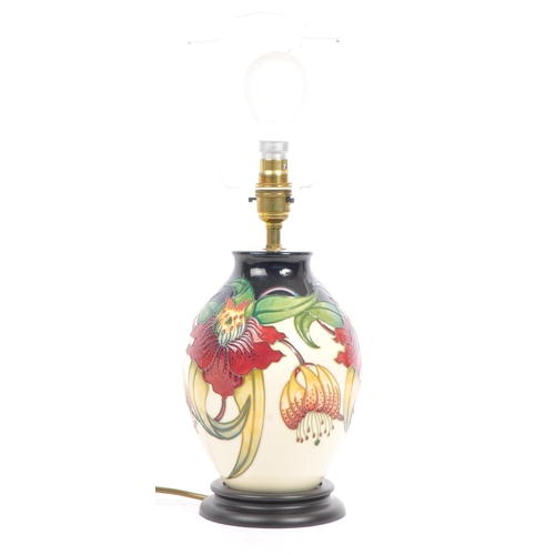 72 - Moorcroft Pottery - Contemporary Anna Lily table desk lamp light. With a ceramic pottery tapering bo... 