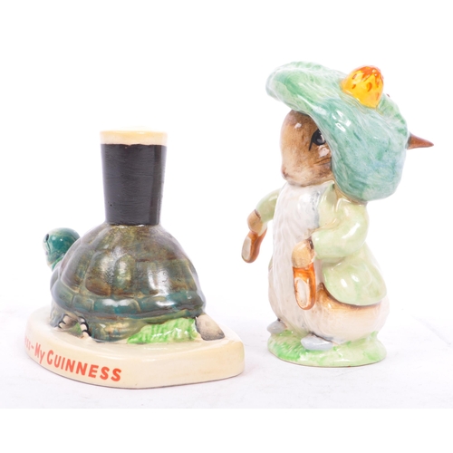 84 - A vintage 20th century Carlton Ware Guinness hand painted advertising Tortoise figure, alongside an ... 