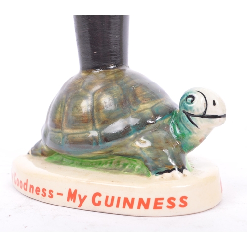 84 - A vintage 20th century Carlton Ware Guinness hand painted advertising Tortoise figure, alongside an ... 