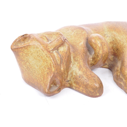 89 - A collection of three large mid 20th century studio pottery cat figures. The collection to include a... 