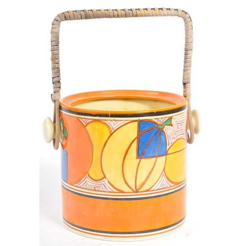 9 - A 20th century circa 1930s Clarice Cliff Fantasque biscuit barrel in the Melons pattern. The biscuit... 