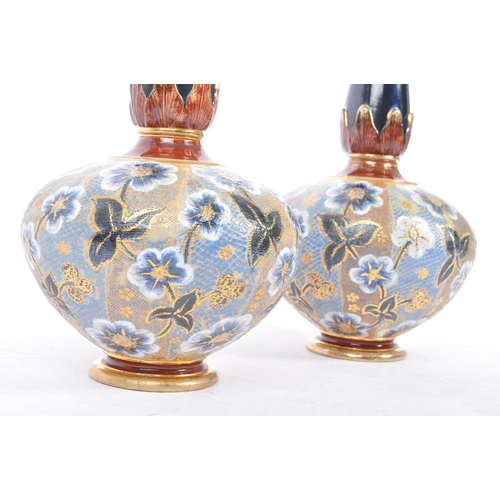 93 - A pair of late 19th century circa 1880s Doulton Lambeth stoneware baluster vases. The vases being ra... 