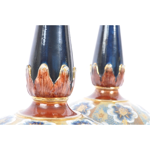 93 - A pair of late 19th century circa 1880s Doulton Lambeth stoneware baluster vases. The vases being ra... 