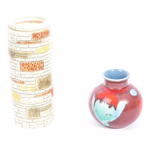 94 - A mid 20th century circa 1960s Poole Pottery vase, alongside a Sylvac example. The Poole Pottery Vas... 