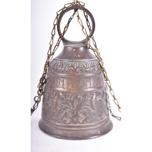 304 - A 19th century heavy brass ecclesiastical bell/church bell/knocker with chain, the bell is decorated... 