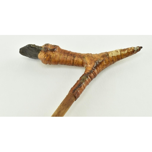 107 - A Papua New Guinea small tribal adze axe. The axehead of stone, in rattan V shaped mount with a wood... 