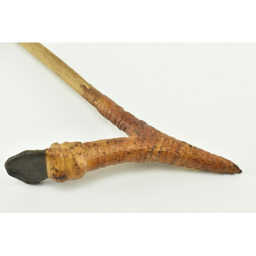 107 - A Papua New Guinea small tribal adze axe. The axehead of stone, in rattan V shaped mount with a wood... 