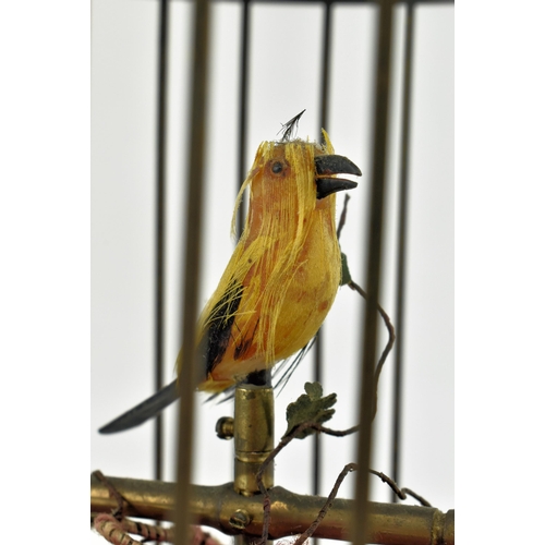 109 - A German gilt metal bird cage automaton with single yellow mechanical bird & twisting stems. Unknown... 