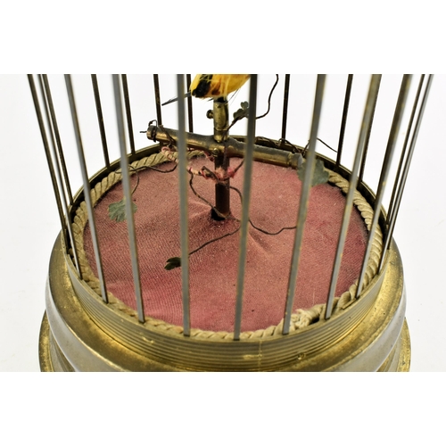 109 - A German gilt metal bird cage automaton with single yellow mechanical bird & twisting stems. Unknown... 