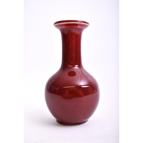 111 - A 20th century Chinese Oriental Qing Dynasty style Sang de Boeuf red ox blood glazed ceramic vase. T... 