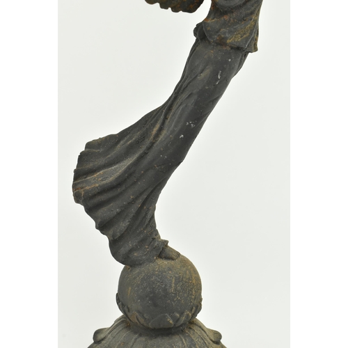 112 - A Victorian 19th century Grand Tour style bronze candlestick holder in the shape of The Winged Victo... 