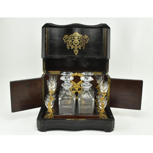 128 - A 19th century French circa 1860-1870 Napoleon III rosewood ebonised Cave à liqueur tantalus liquor ... 