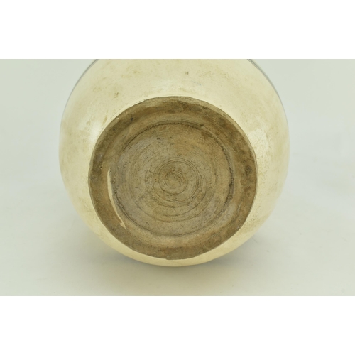 134 - A Chinese Song/Yuan dynasty Cizhou ovoid vase. The vase with spindle shape, supported on a short spl... 