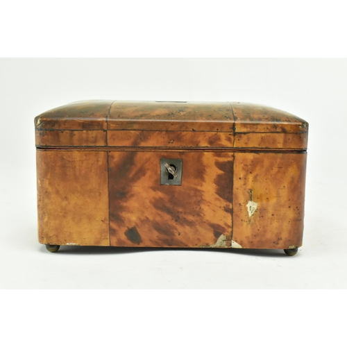 135 - A Regency early 19th century tortoiseshell veneered tea caddy box. The caddy having a chamfered top ... 