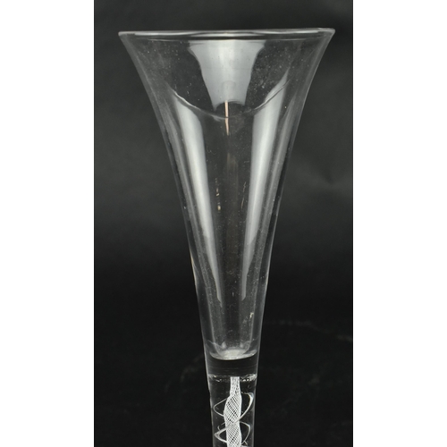 138 - A George III 18th century circa 1760s hand blown wine drinking glass. The glass having a trumpet sha... 