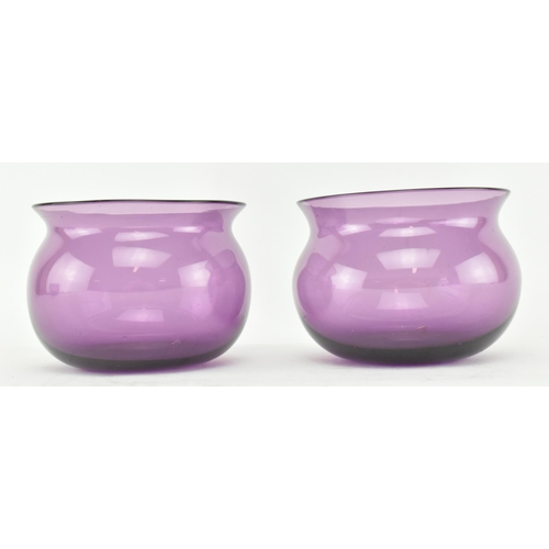 139 - A pair of early 19th century amethyst finger bowls, along with another similar example. Each bowl of... 