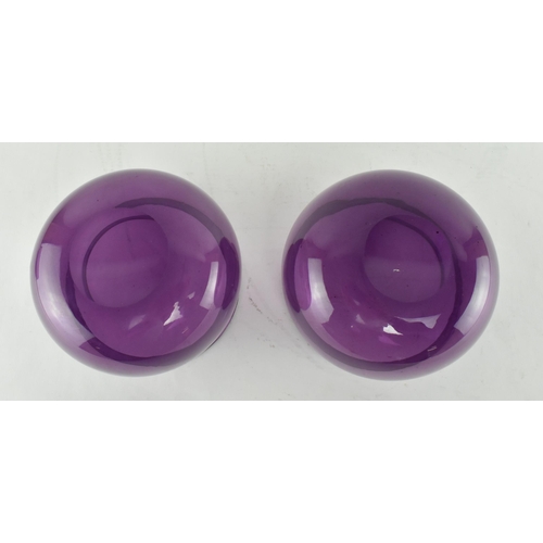 139 - A pair of early 19th century amethyst finger bowls, along with another similar example. Each bowl of... 