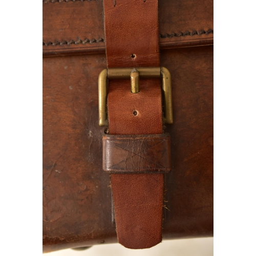 141 - The Army & Navy Co-operative, London - An early 20th century brown leather travel briefcase / suitca... 