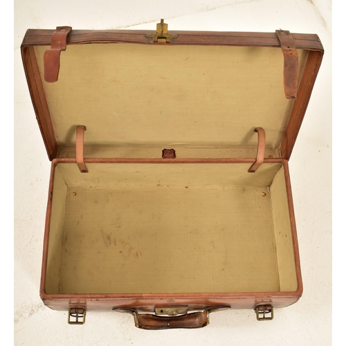 141 - The Army & Navy Co-operative, London - An early 20th century brown leather travel briefcase / suitca... 