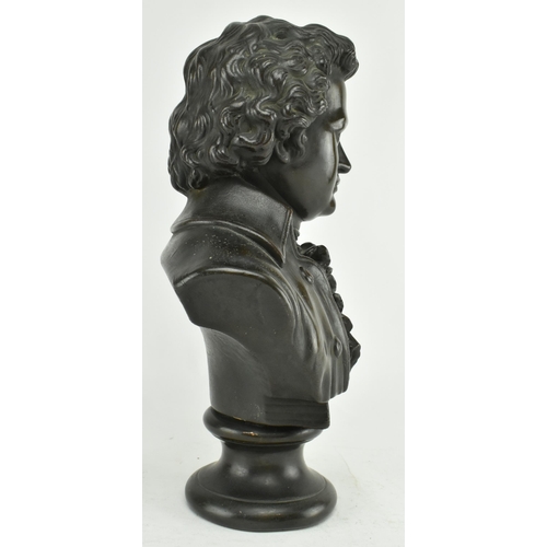 143 - An early 20th century circa 1900 cast bronze bust of composer Wolfgang Amadeus Mozart. The sculpture... 