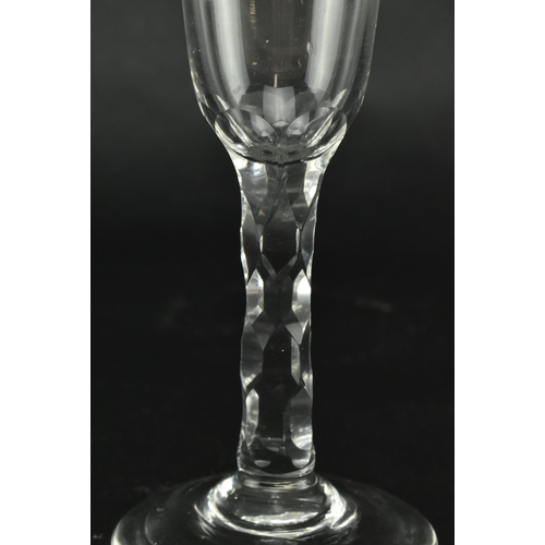 147 - A George III late 18th century hand blown ale drinking glass. The glass having a funnel bowl with et... 